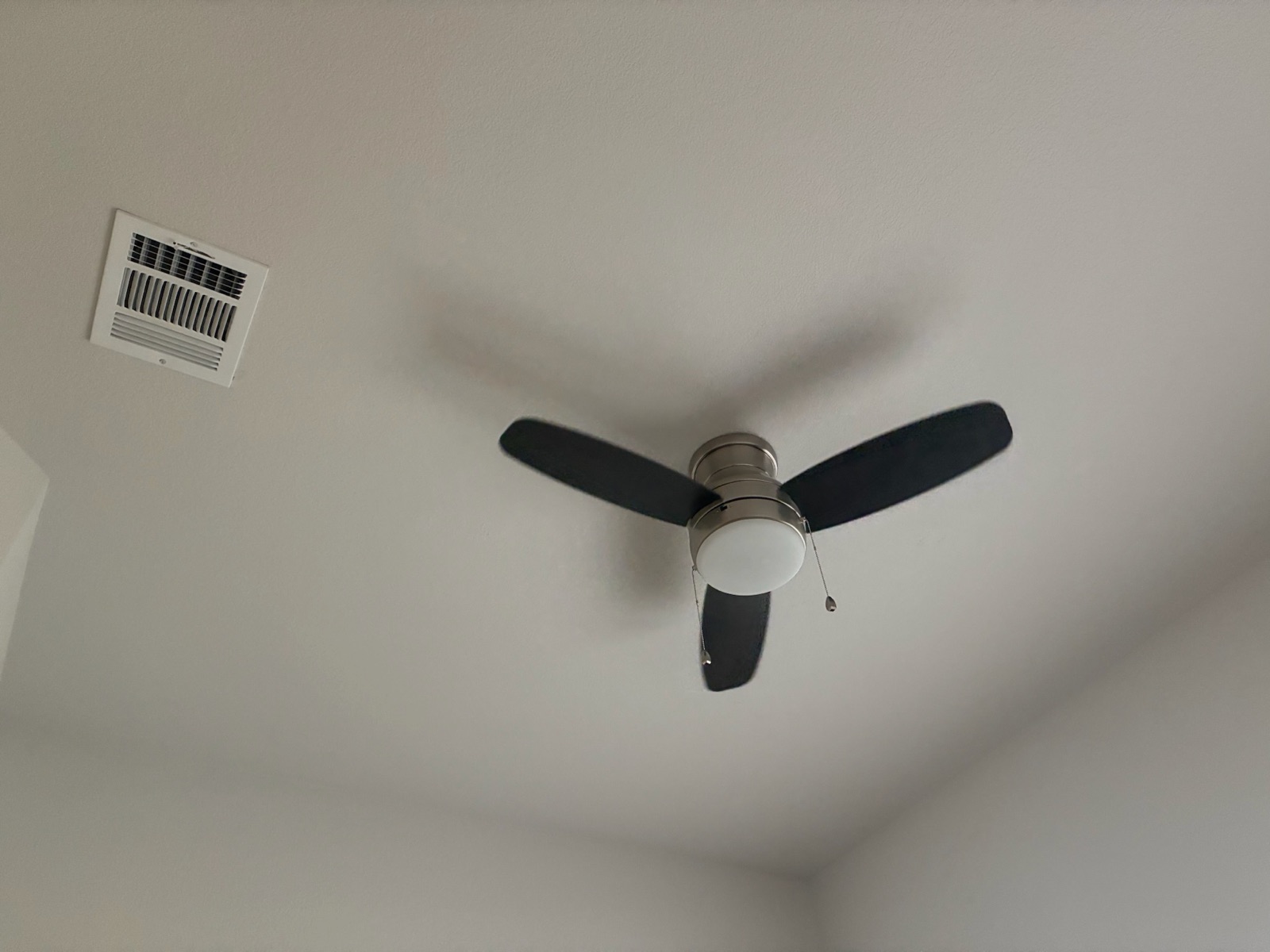 Flush-mount ceiling fan with light installed in place of a ceiling light
